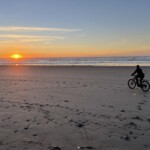 Beach biking at sunset