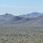 The Wall slides up and over the hills